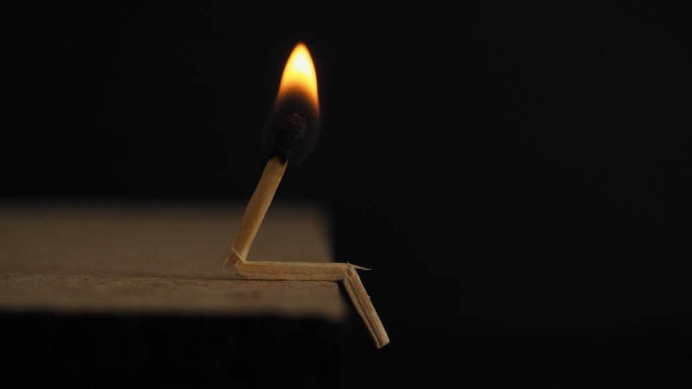 A lit match.