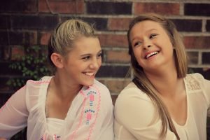 Two teens laughing
