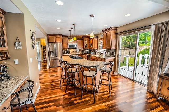 A kitchen island can serve as a basis to many Simple apartment decoration ideas.