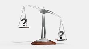 Scales with question marks on them