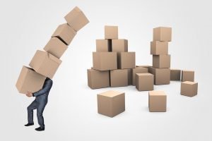 a man holding boxes