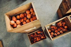Do not place fruits like peaches in storage container pods. 