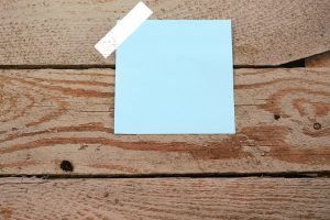 Blue label paper on a wooden box.