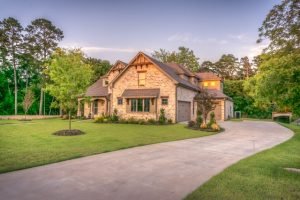 A nice looking home with a clean driveway