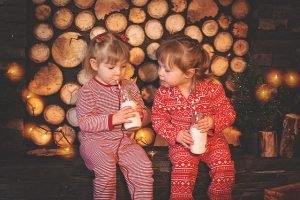 Two baby girls in pajamas