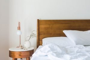 A bed with linens