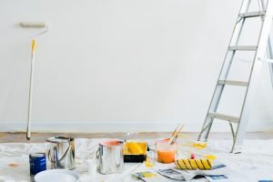 Ladders and paint buckets.