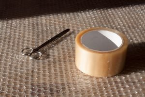 Scissors, bubble wrap and packing tape. 
