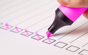 checklist and pink marker