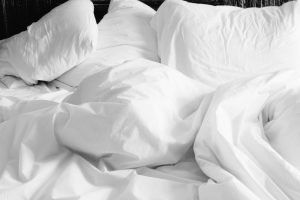 mattress and pillows on the bed