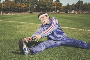 woman stretching in the park