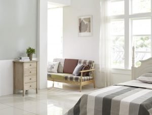 Bedroom in light colors walls and furniture
